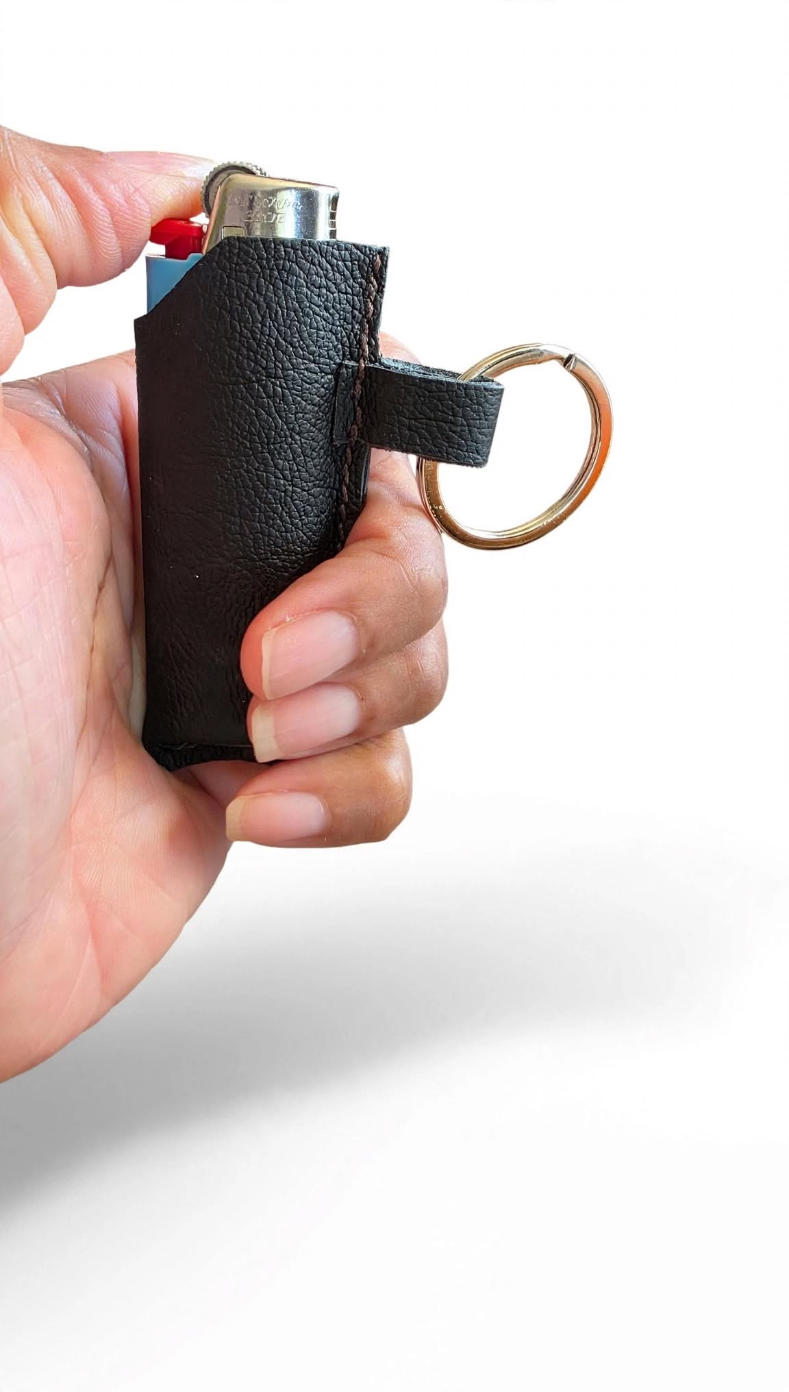 Hand holding Lighter sleeve
